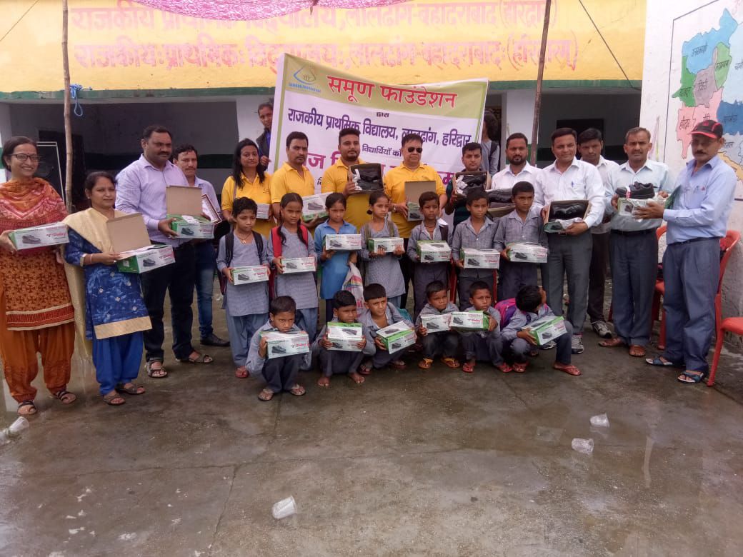 SHOES DISTRIBUTED TO THE STUDENTS OF PRIMARY SCHOOL OF LALDHANG